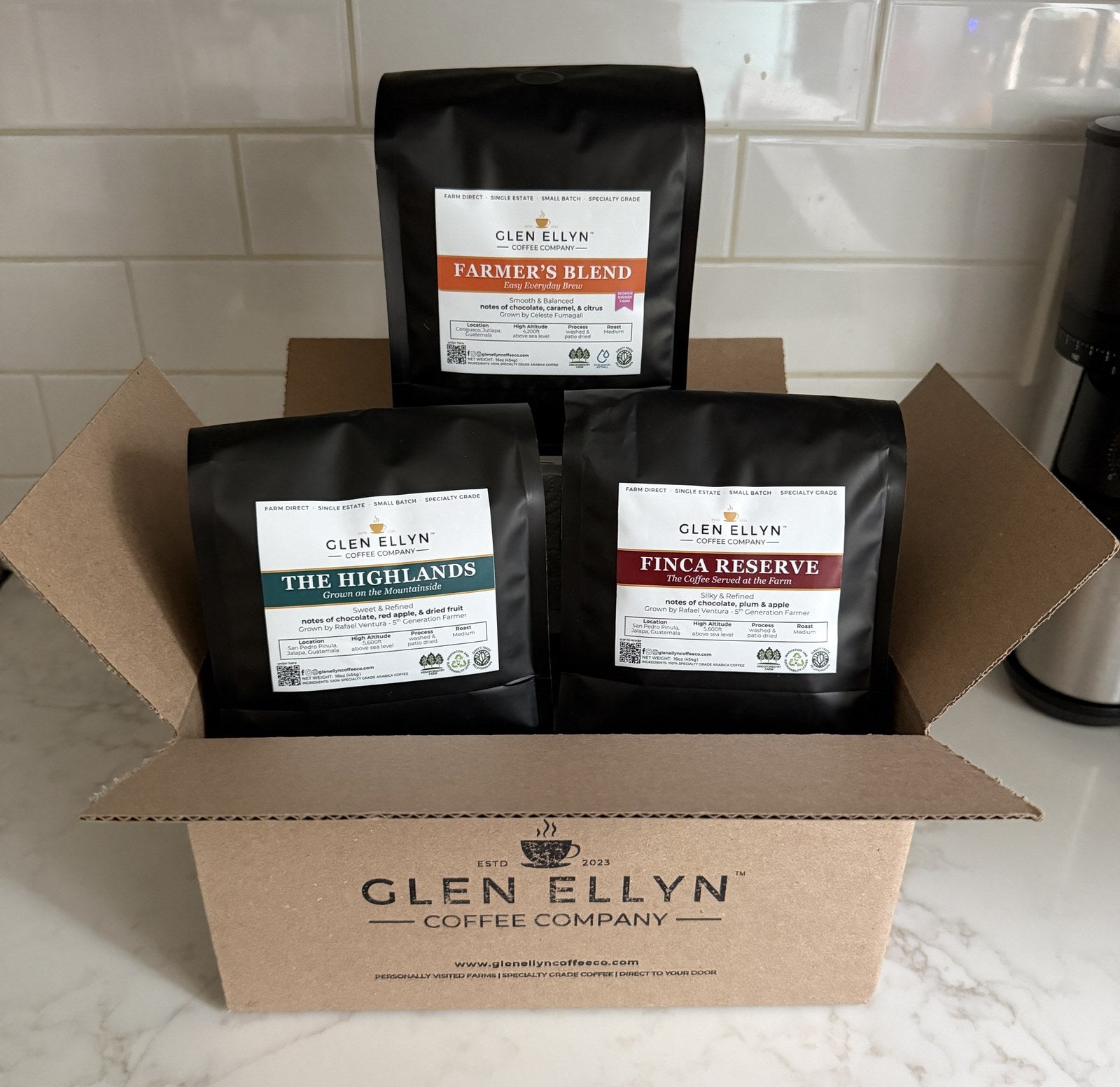 Three bags of Guatemalan coffee in a Glen Ellyn Coffee Company box